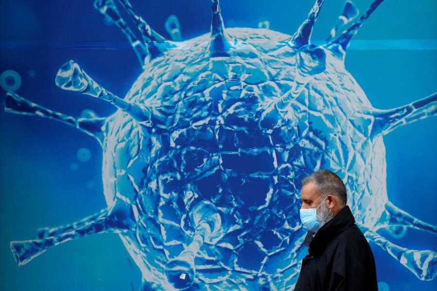 WHO seeks to take political heat out of virus origins debate