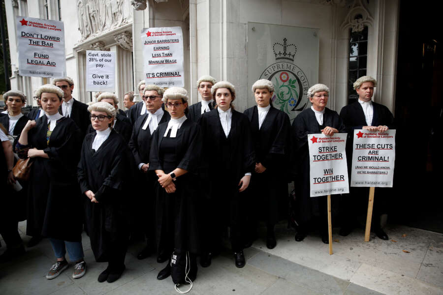 UK trial lawyers to end strike after accepting government pay offer