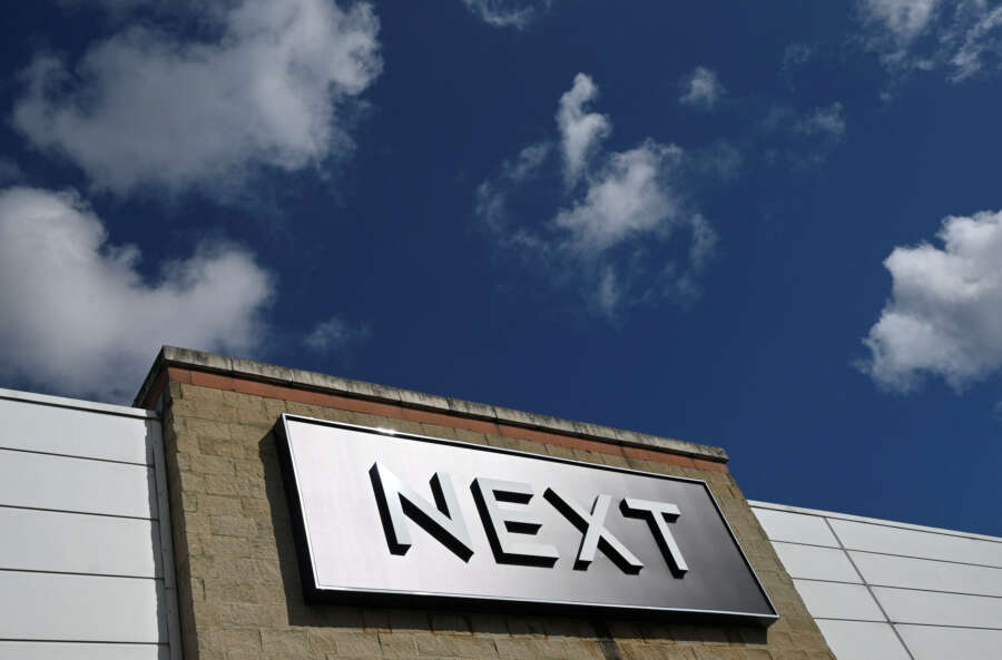 Britain’s Next sees lower clothing inflation, shares dip on cautious outlook