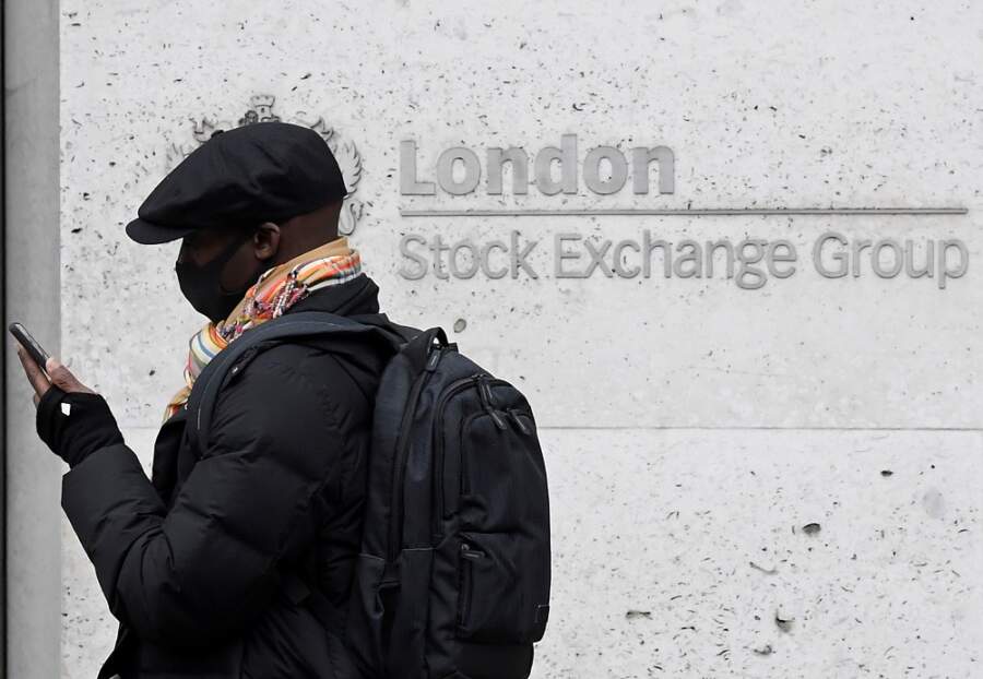 UK midcaps slip as inflation hits 3-decade high; Tesco slides