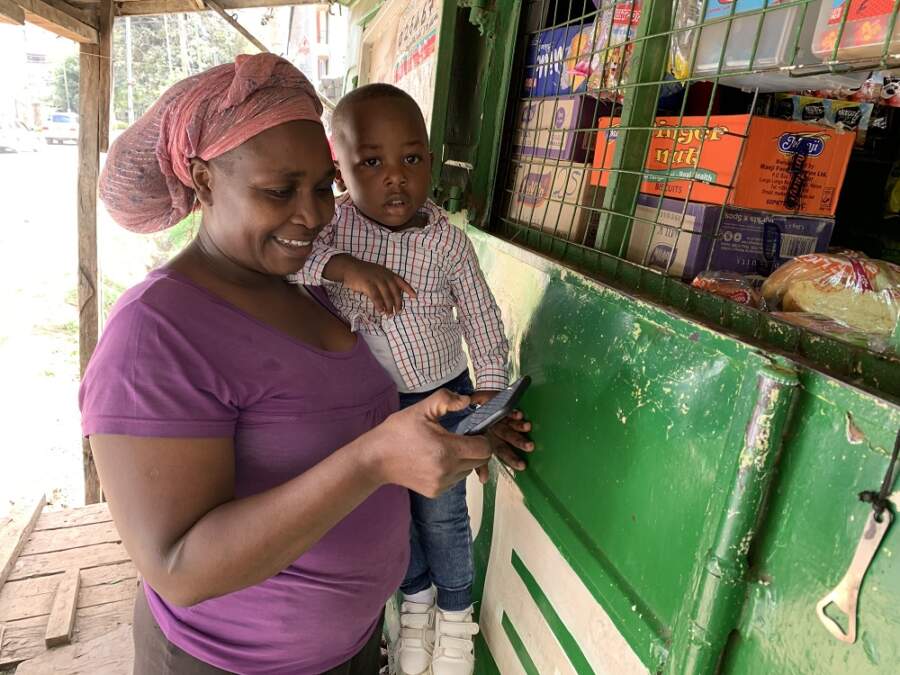 FEATURE-Africa’s mobile money taxes risk driving poor out of digital economy