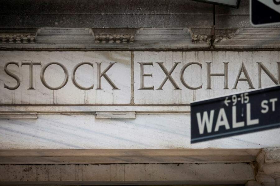 Wall St stocks fall, bond yields rise as China drops quarantine rule