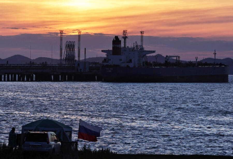 Oil set to end turbulent 2022 modestly higher