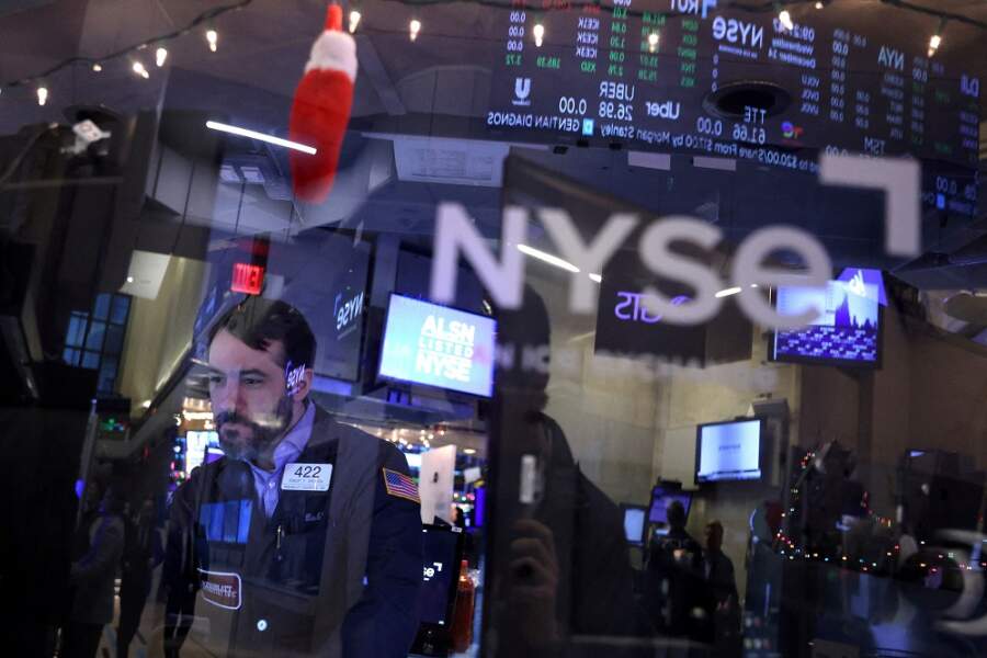 Stocks, bonds extend rally on hopes rate hikes ease