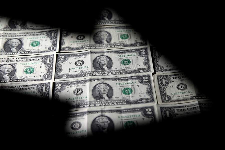 Dollar drops as inflation cools more than expected