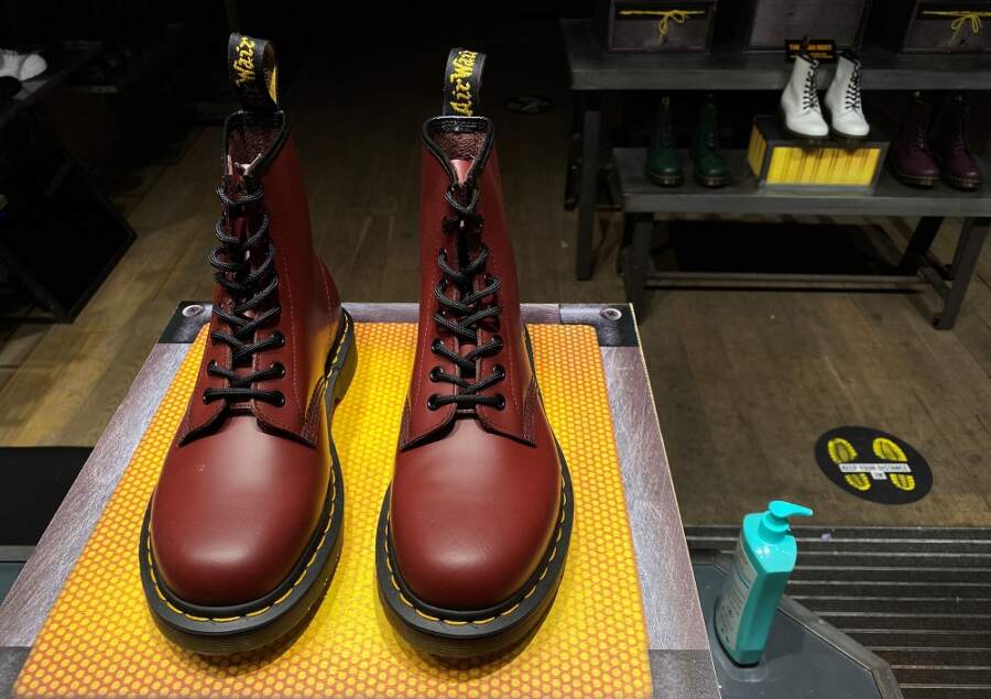 Bootmaker Dr Martens warns on profit as finance chief walks