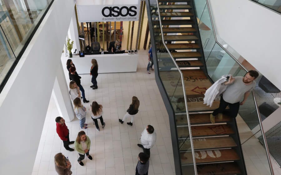 ASOS reports first-half loss as shoppers cut back