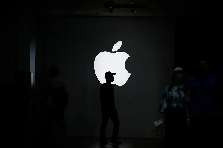 Apple cuts about 100 digital services jobs, Bloomberg News reports