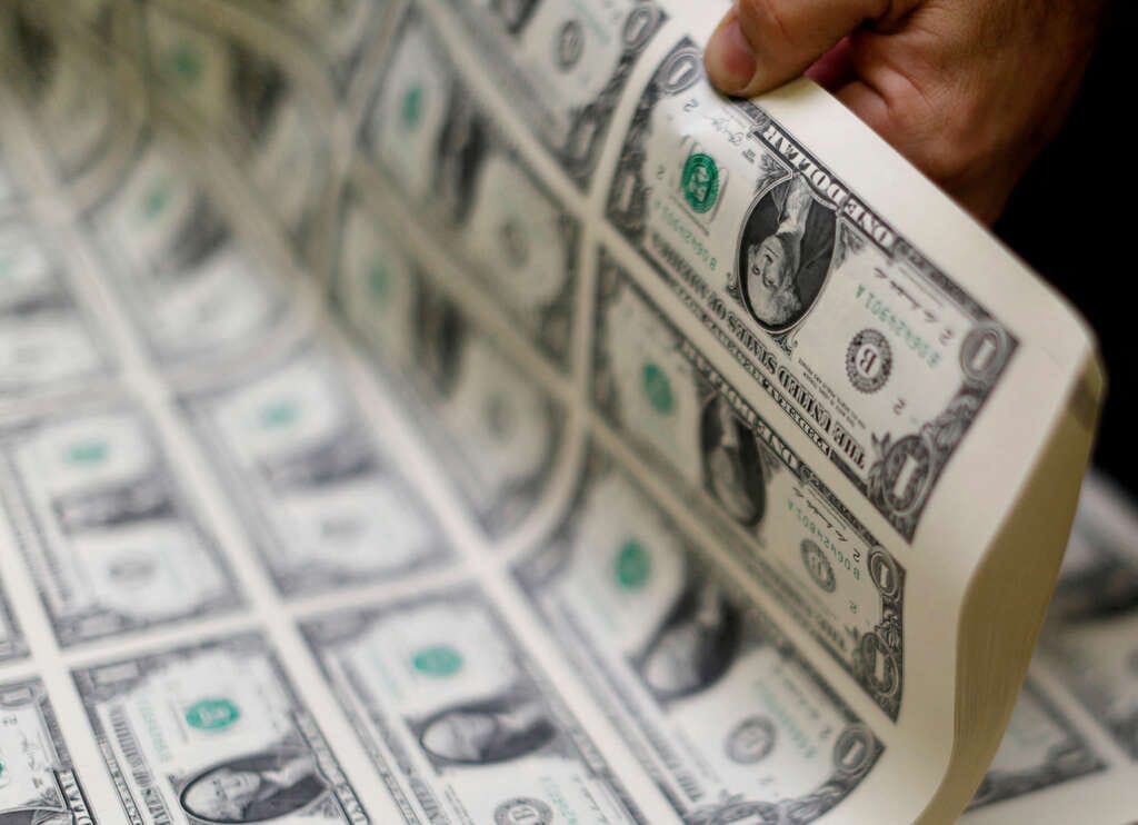 Dollar steadies near 16-week low, yuan set for biggest weekly gain since 2005