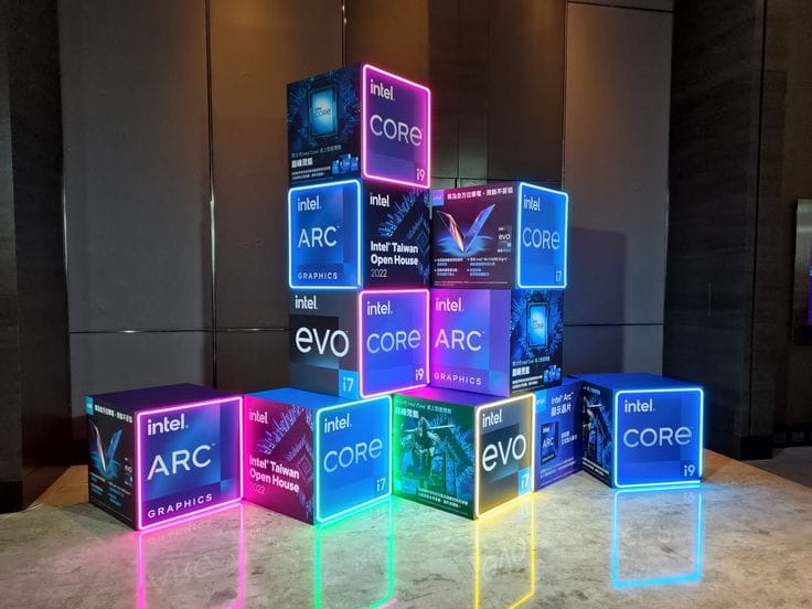 This may contain: an assortment of intel core products displayed in front of a large display case with the company's logo on it