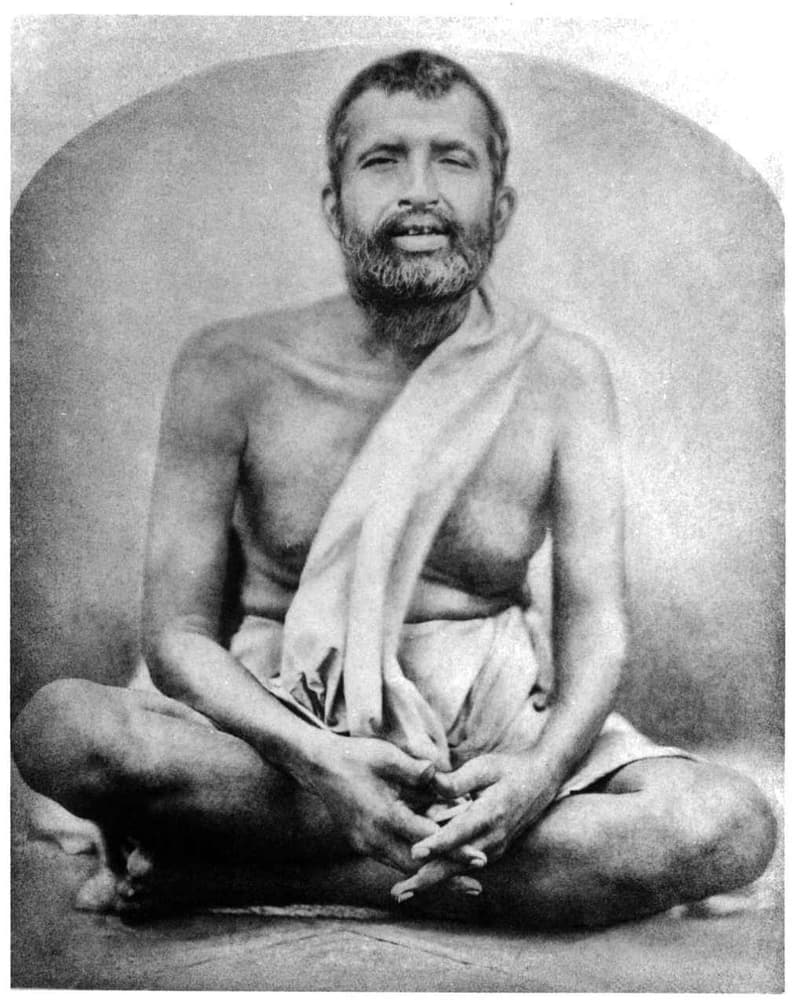 A black-and-white photo of Swami Ramakrishna Paramahamsa taken at the Dakshineshwar Kali Temple in Kolkata, West Bengal.