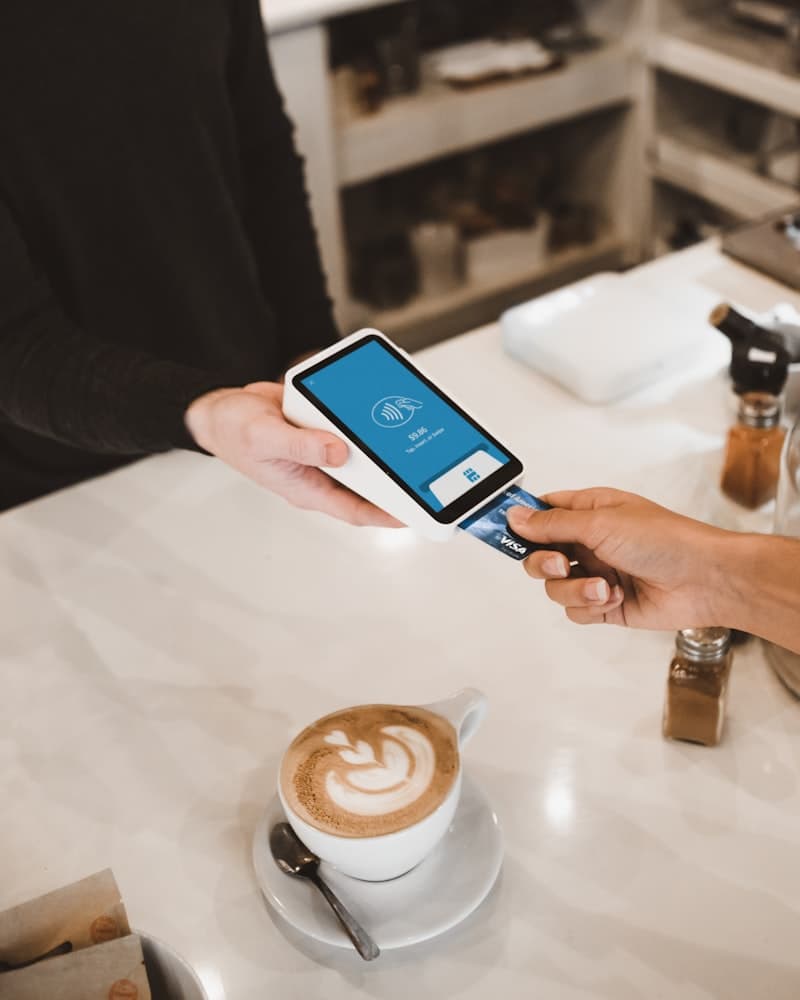 A person using an AI financial assistant app on a smartphone