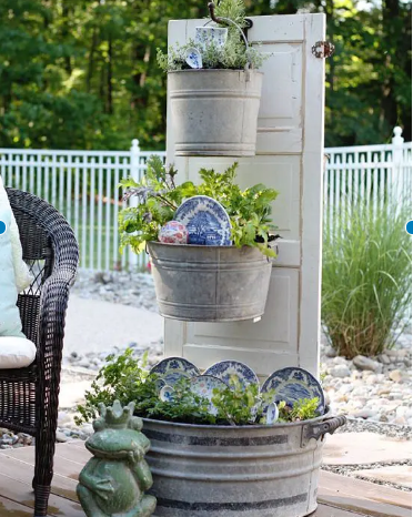 Recycled old door and pots vertical garden