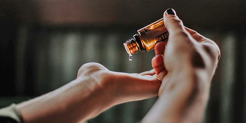 Dropping Lavender Oil on Palm