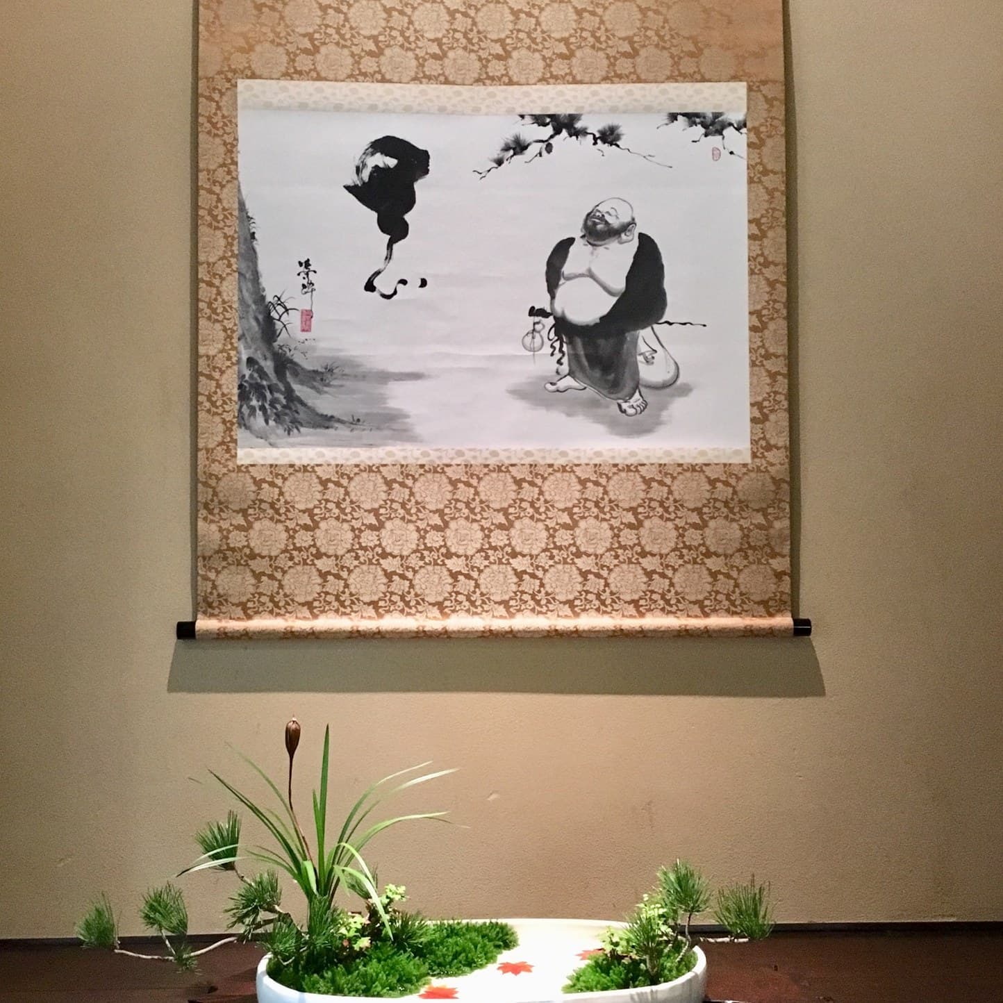 Moribana ikebana arrangement in a low container