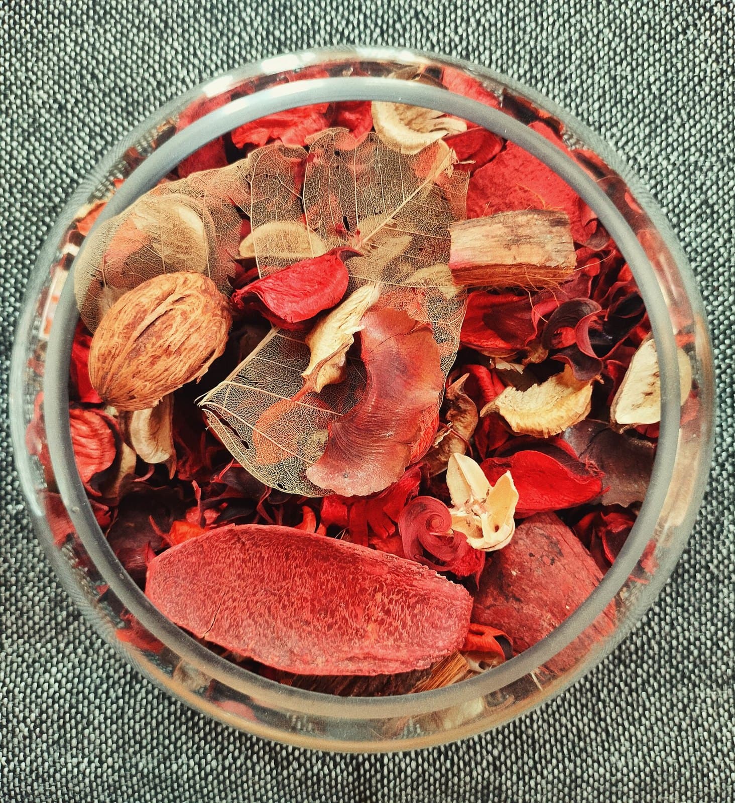 Potpourri of dried petals in a glass bowl