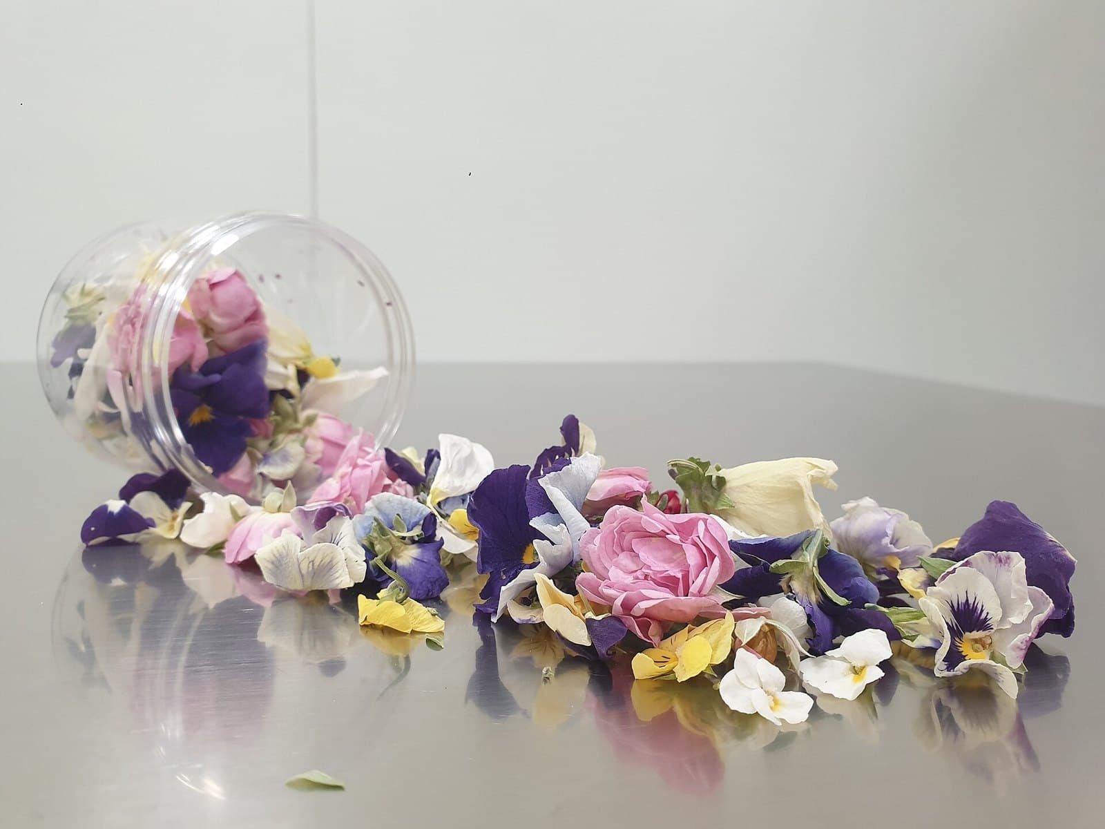Edible rose and pansy flowers used as garnish