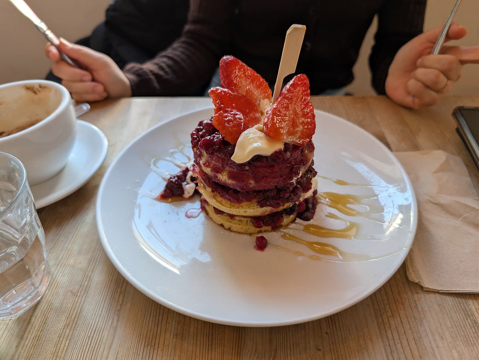 Pancakes with berries and crème fraîche