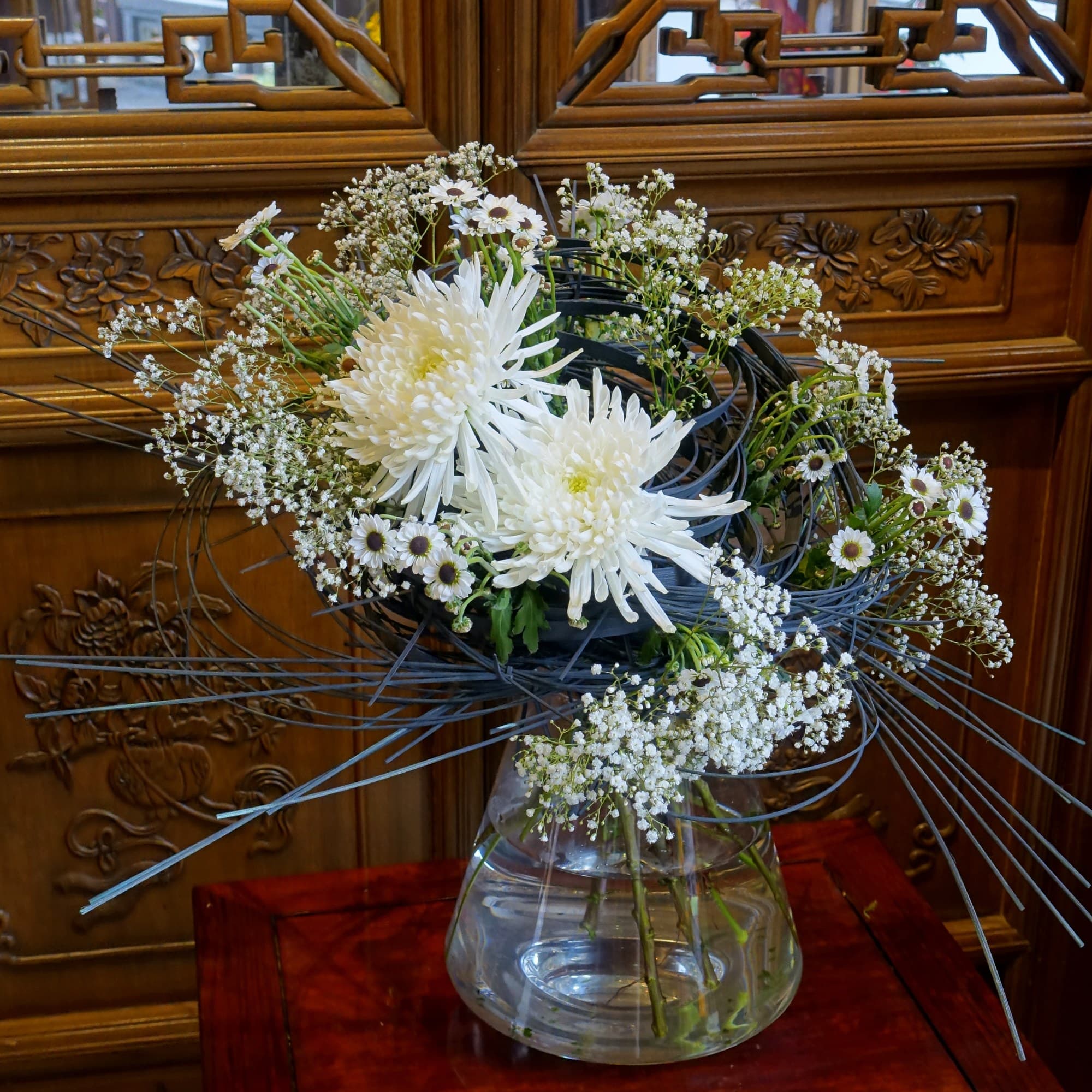 Chinese-style floral arrangement in a vase, Lan Su Chinese Garden