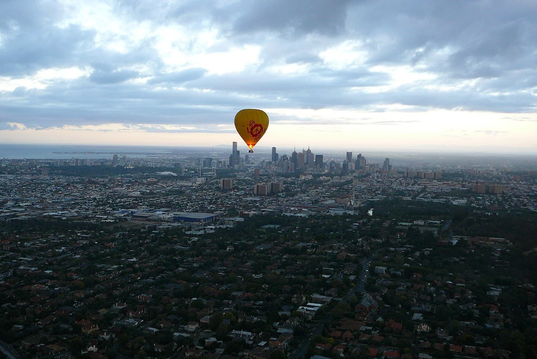 Hot air balloon over Melbourne at dawn