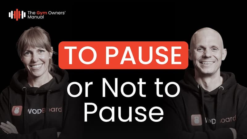 Promotional graphic titled "TO PAUSE or Not to Pause," showing headshots of two smiling fitness professionals wearing WodBoard branded sweatshirts.