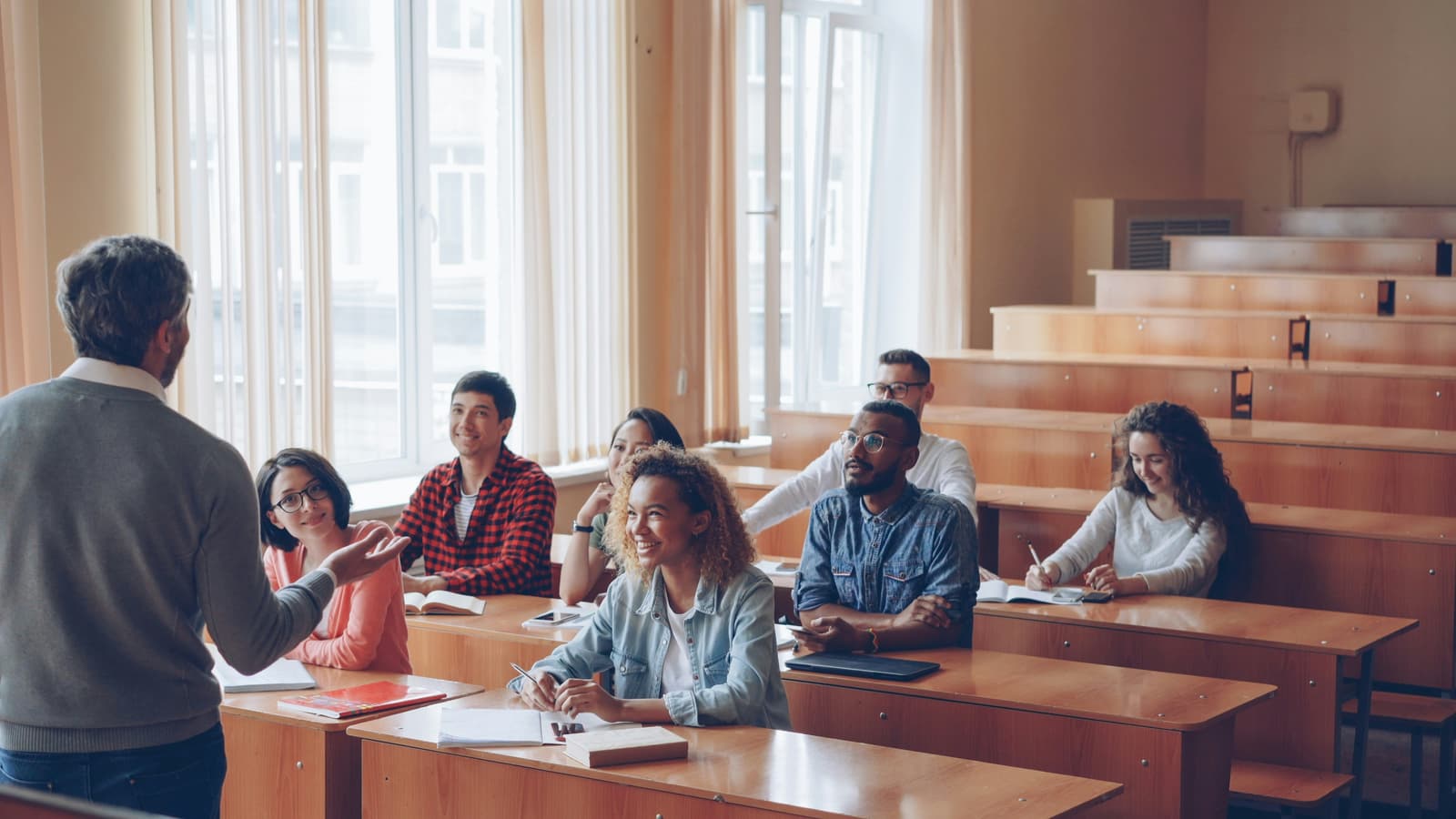 Medical college faculty teaching students in a lecture hall